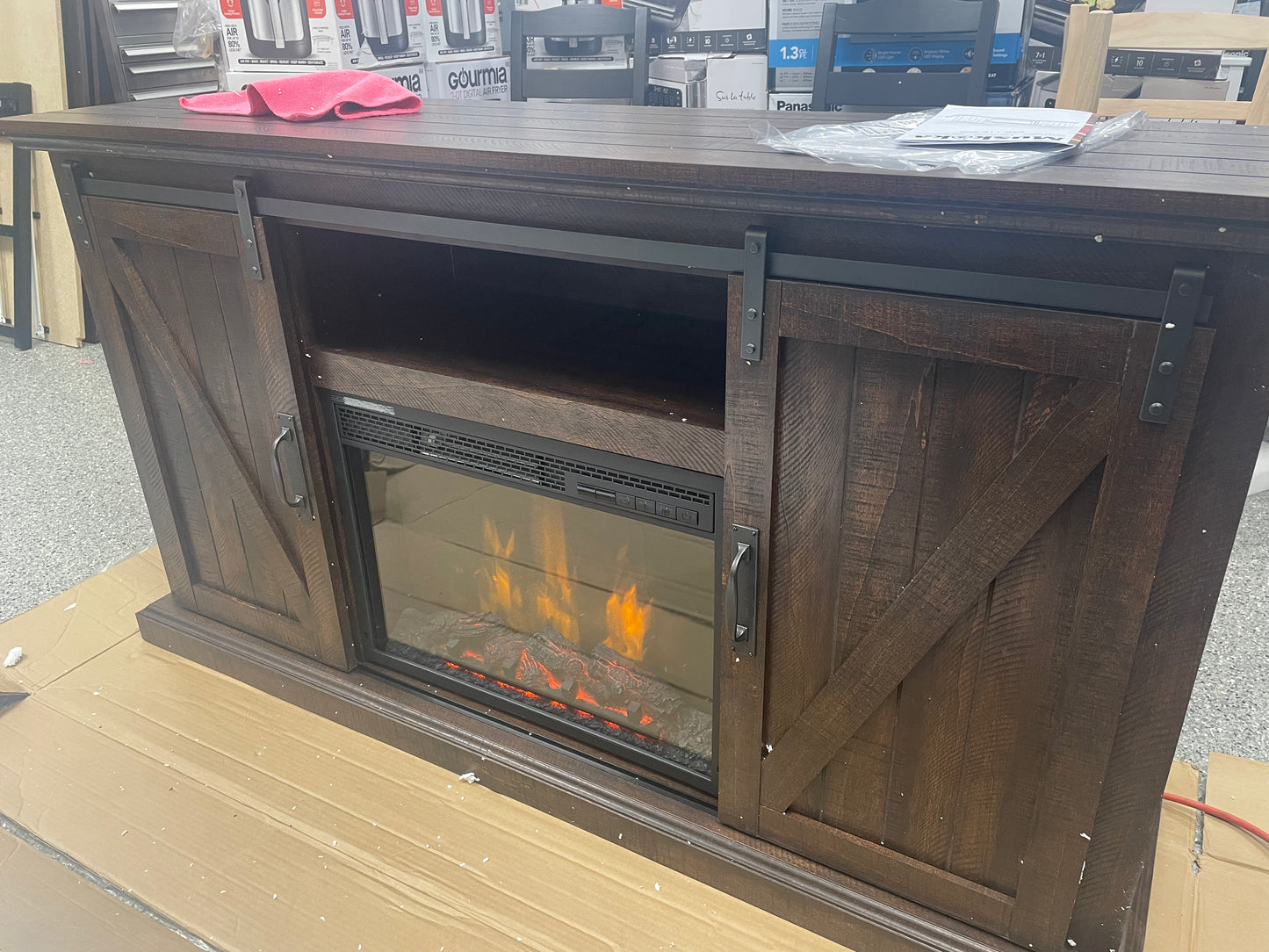 Muskoka Langdon 58 in. Freestanding Infrared Electric Fireplace TV Stand with Sliding Barn Door in Rustic Brown