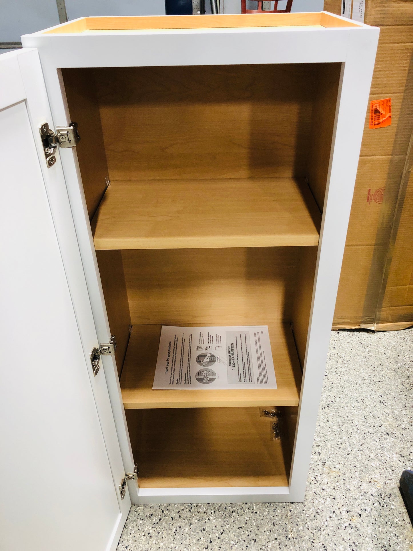 Hampton Bay Courtland Polar White Finish Laminate Shaker Stock Assembled Wall Kitchen Cabinet 18 in. x 42 in. x 12 in.