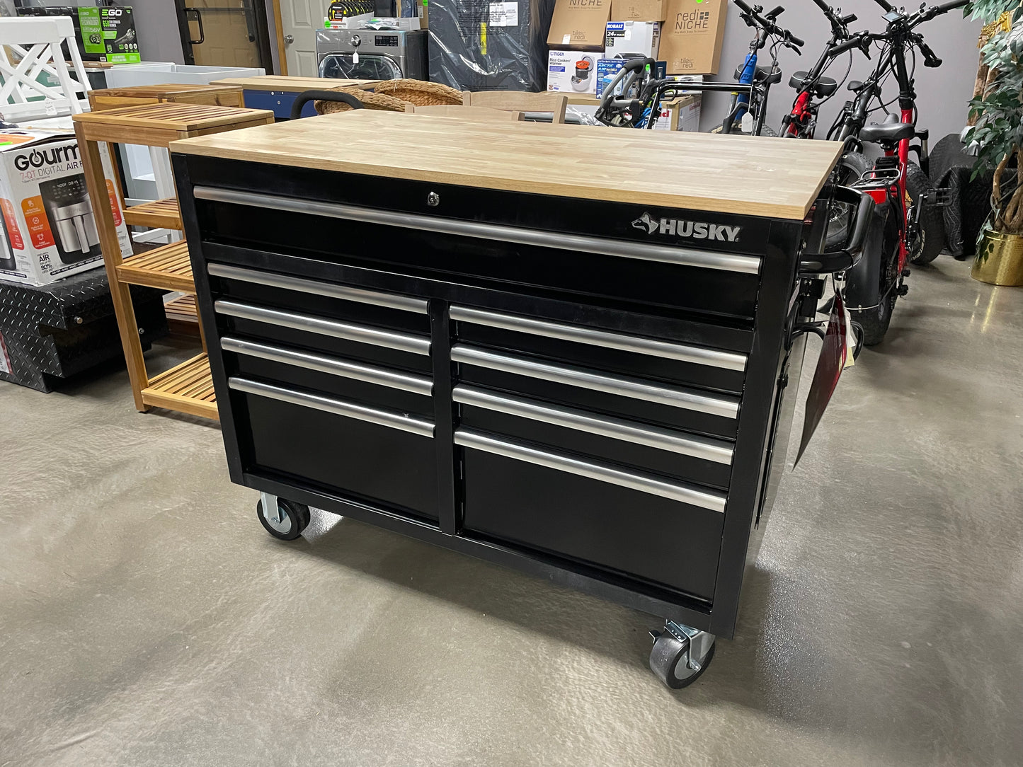 Husky 46 in. W x 24.5 in. D Standard Duty 9-Drawer Mobile Workbench Tool Chest with Solid Wood Top in Gloss Black